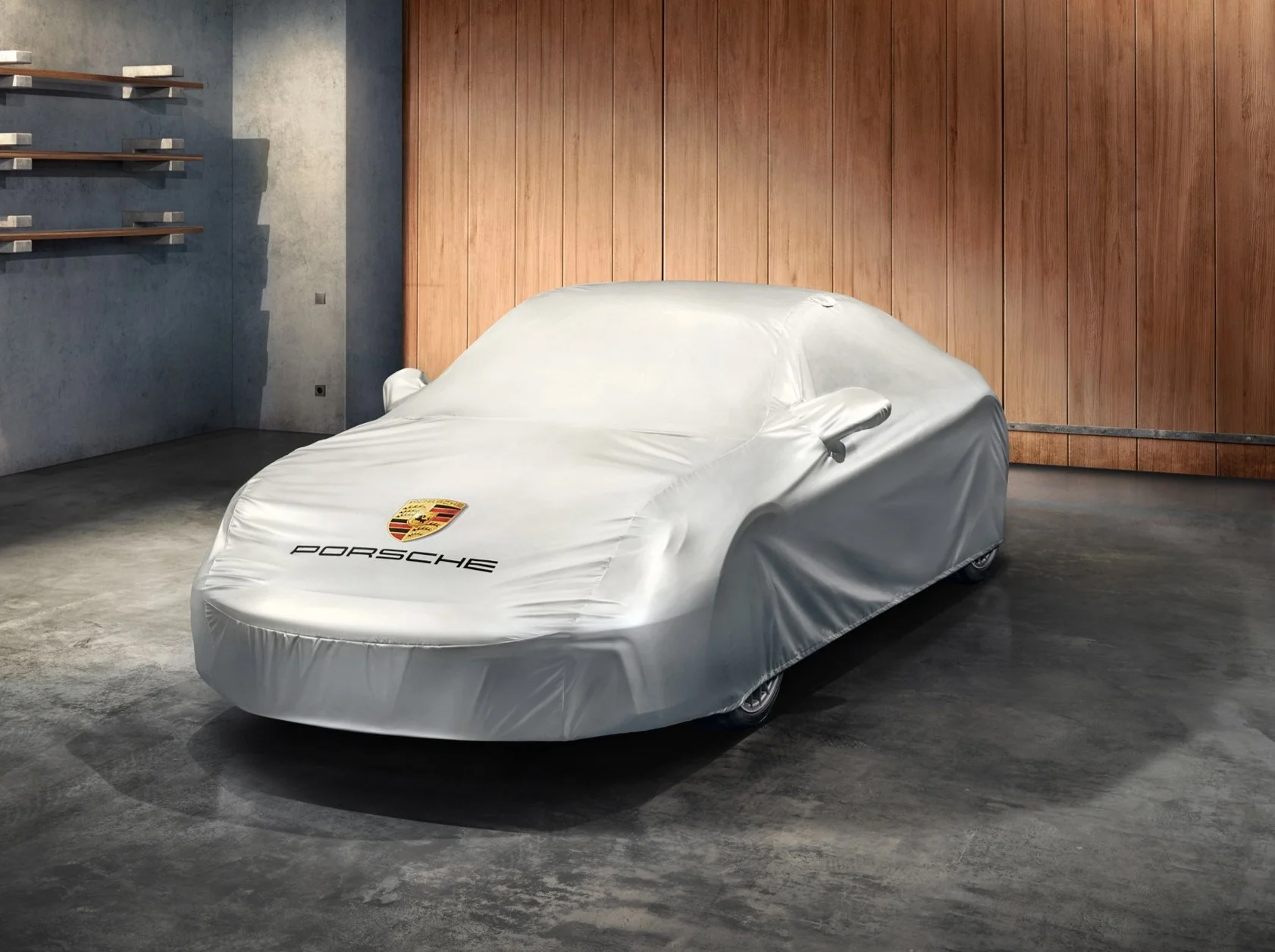 Image of a Porsche 911 under a car cover.
